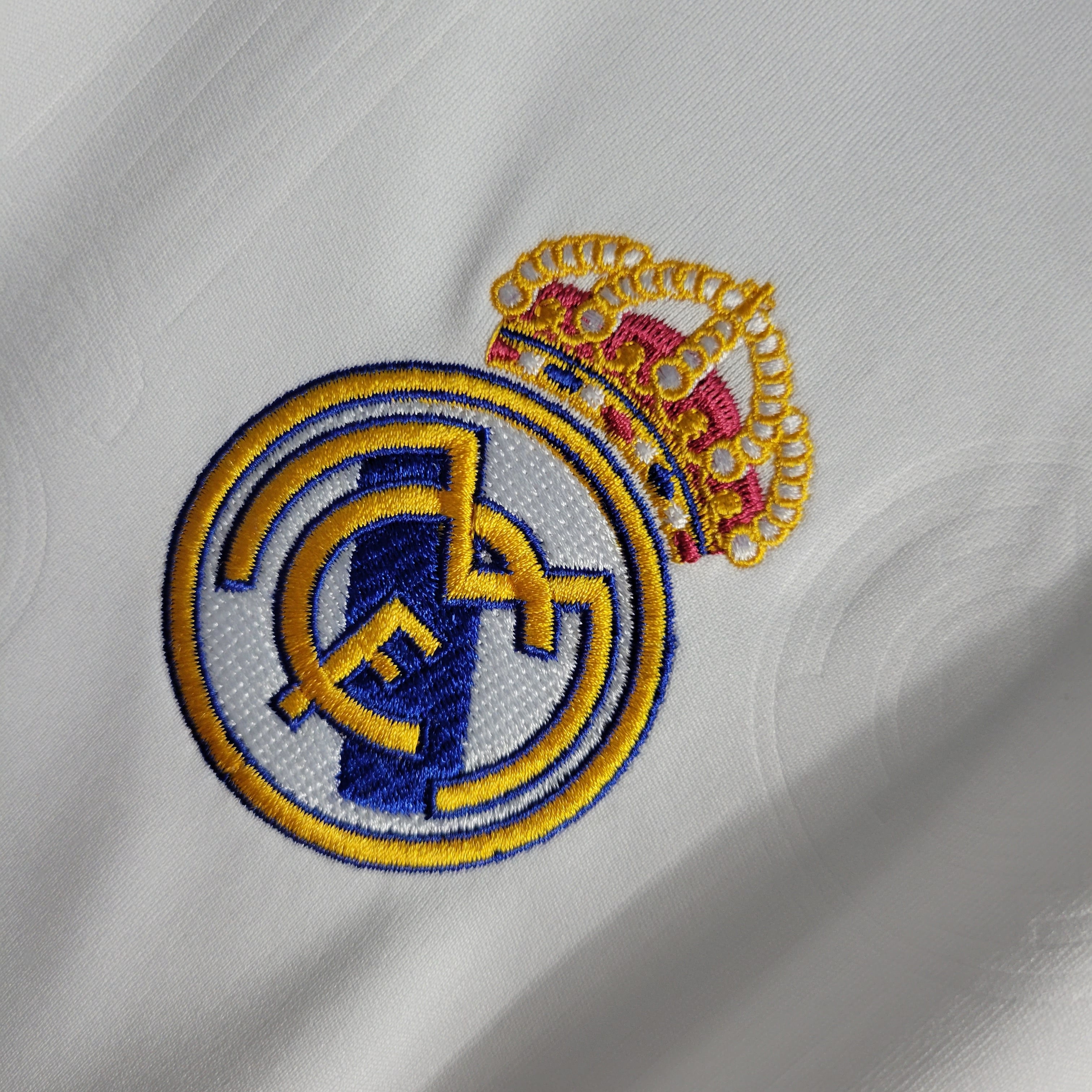 Adidas real outlet madrid logo